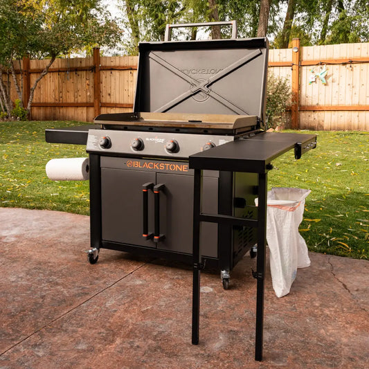 Blackstone culinary 36 inch griddle with matte black finish flat-top cooking surface and side tables with cabinet
