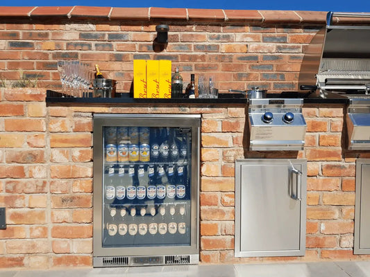 Blastcool Extremis XP1 premium outdoor beverage fridge stainless steel with glass door and shelves stocked with bottled drinks