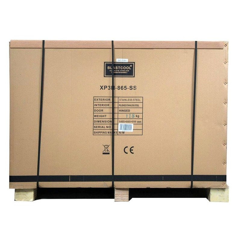 Brown cardboard shipping crate with black straps and label for blastcool extremis xp3 stainless steel triple door outdoor fridge