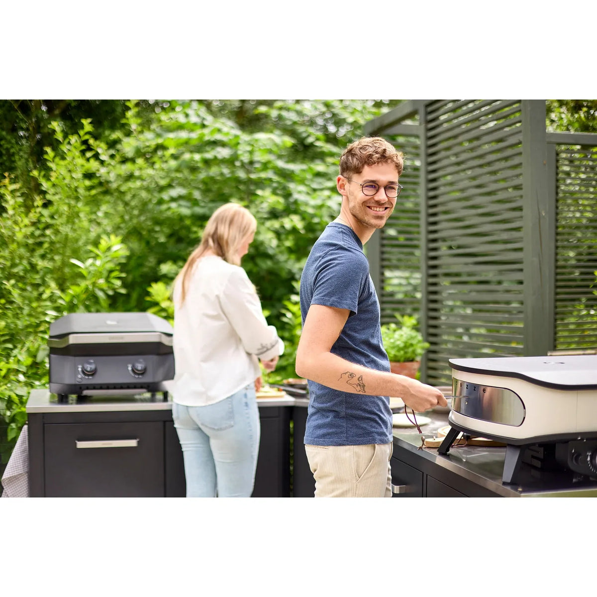 Black and silver outdoor grill with sleek modern design featured in Cozze outdoor kitchen 180 cabinet 90528