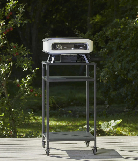 Cozze outdoor pizza oven table 60 with silver and black portable gas grill featuring a sleek modern design
