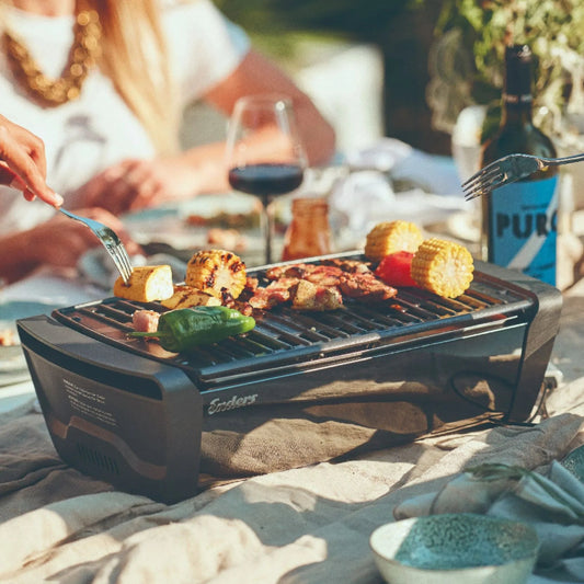 Black electric Enders Aurora tabletop BBQ grill with sleek modern design and endless brand name on side
