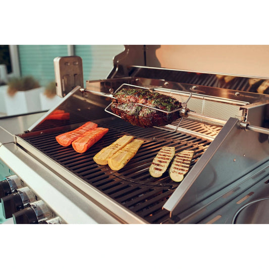 Enders Kansas Pro 3 rotisserie kit stainless steel grill attachment with seasoned roast beef and vegetables grilling beside it