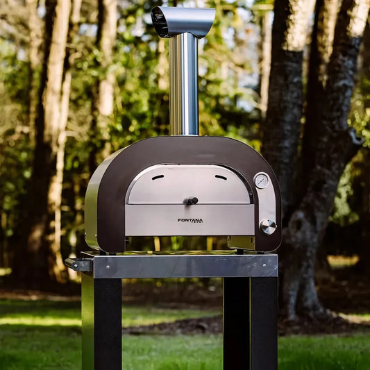Fontana Maestro 60 gas countertop pizza oven with stainless steel and black enamel, curved door, pressure gauge, and chimney