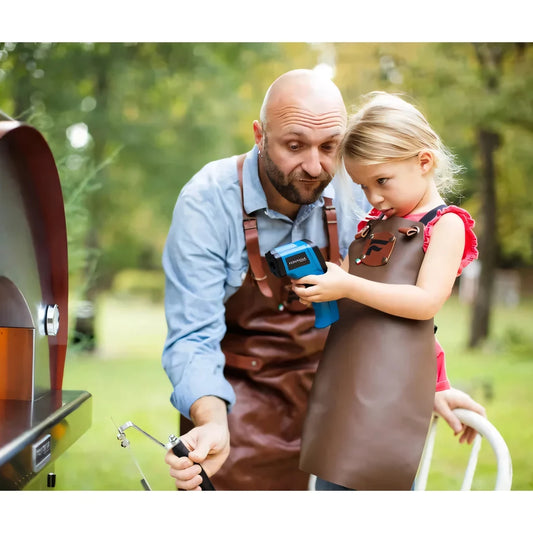 Blue and black non-contact infrared thermometer held by a child for use with fontana margherita anthracite wood-fired pizza oven