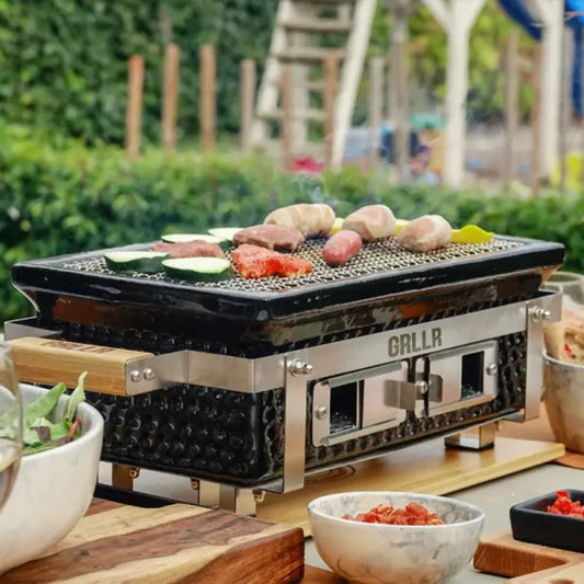 Black and stainless steel grllr osaka shichirin rectangular tabletop grill with mesh surface wooden handles and side vents