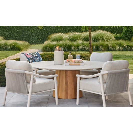 Cream-colored woven textured outdoor dining chairs with light gray cushions and white metal frames for happy cocooning lumi rib tabletop gas fireplace setup