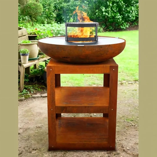 Rustic oval fire pit with black metal grate and burning flames on a wooden stand in heat turret grill for bakka bbq