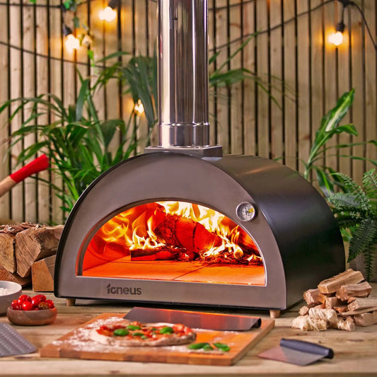 Igneus Classico wood-fired pizza oven in stainless steel and black enamel with visible fire branded ioneus
