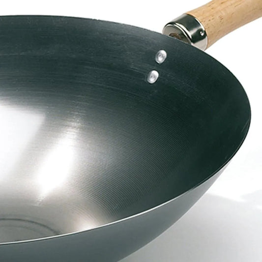 Black carbon steel HOT WOK wok pan 35cm with light wood handle and silver rivets for versatile cooking