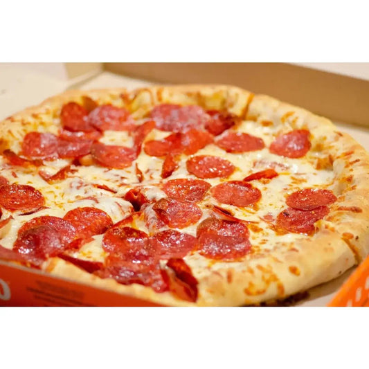 A freshly baked pepperoni pizza with golden crust and melted cheese illustrating common outdoor kitchen problems.