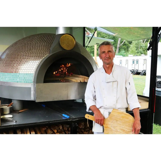 Chef with pizza oven and peel