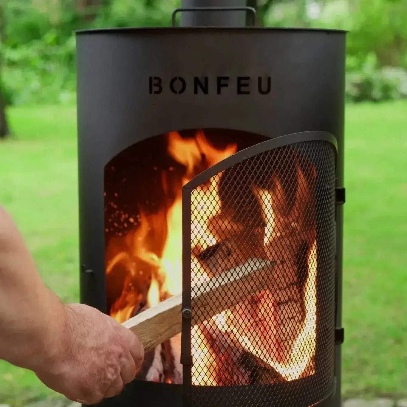 Charcoal or wood-burning outdoor fireplace brick and steel