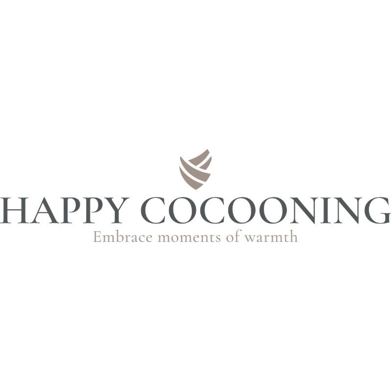 Gray happy cocooning logo with stylized leaf emblem above brand name and tagline in happy cocooning collection