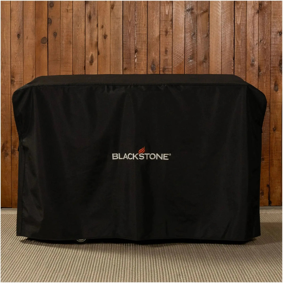 Blackstone 28 inch black grill cover made of durable material for protecting griddles from weather elements