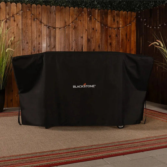 Blackstone 36 inch griddle cover made of black fabric with a white logo for outdoor grill protection
