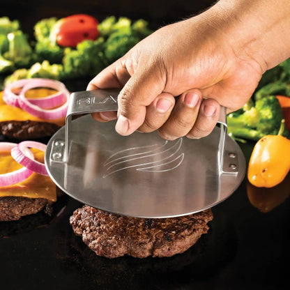 Stainless steel blackstone smash burger press with sleek modern design and engraved logo in a 3-piece kit