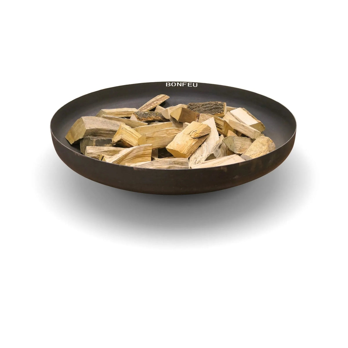 Black bonfeu bonbowl corten steel fire bowl filled with light-colored wood chunks for outdoor fire pit use