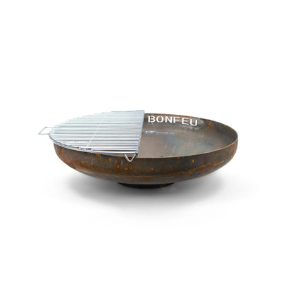 Rustic brown corten steel BonFeu BonBowl Plus fire pit with silver metal grill insert and BonFeu engraving on side