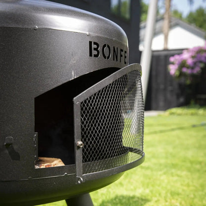 Black metal fire pit with mesh door and bonfeu branding bonfeu bongiro compact outdoor fireplace 5501