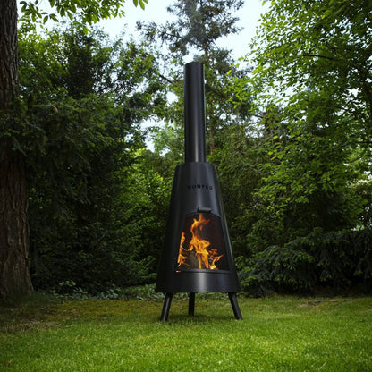Black metal bonfeu bonpyra large outdoor fireplace with conical design and visible flames inside