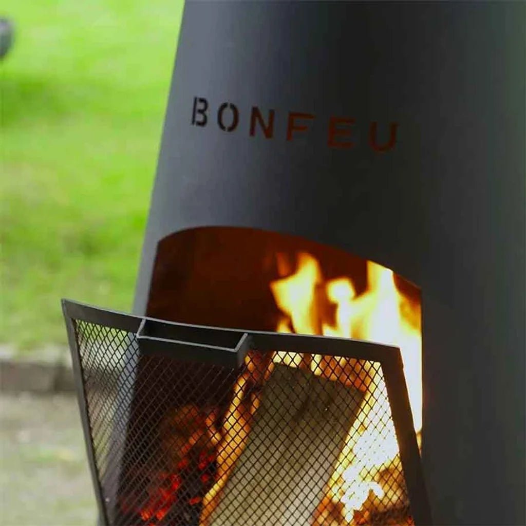 Black cylindrical metal outdoor fire pit with bonfeu branding and mesh screen bonfeu bonpyra large 5003