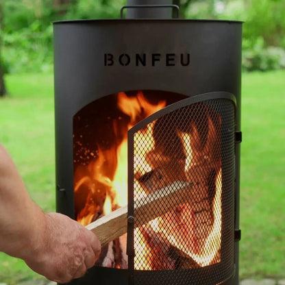 Black metal bonfeu bontino lp outdoor fireplace with mesh door showing visible flames inside