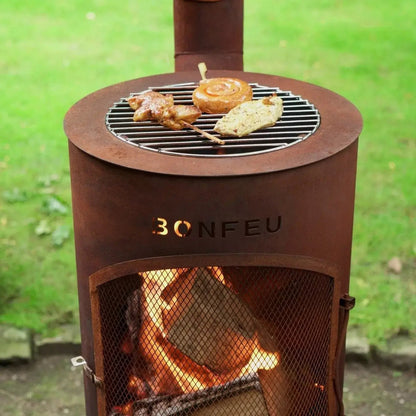 Rust-colored corten steel bonfeu bontino lp outdoor fireplace with mesh front and engraved brand name bonfeu