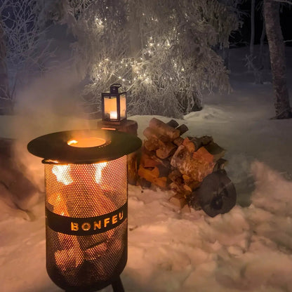 Black mesh bonfeu bonves 34 fire pit fire basket with glowing embers visible through perforated sides