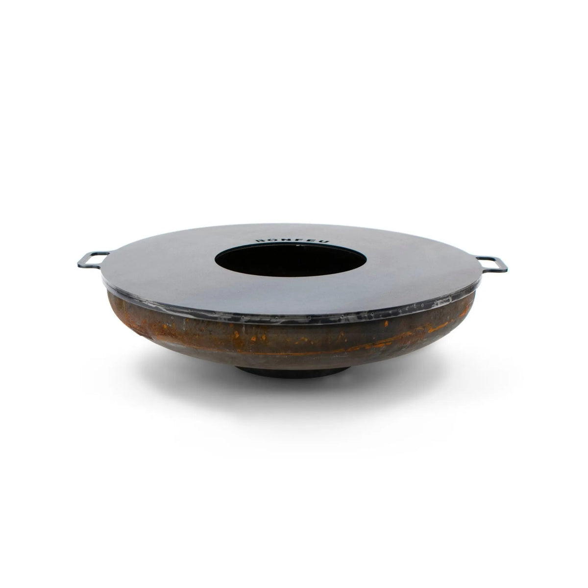 A sleek modern bonfeu plancha fire pit with a matte black top and rusted steel body for bonbowl fire bowls