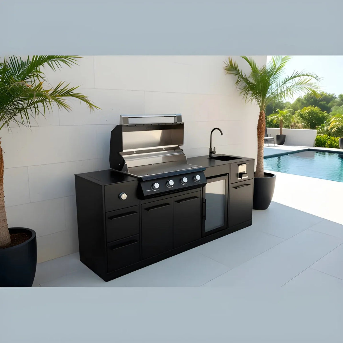Brabura lite maxi 4 outdoor kitchen with black grill unit featuring stainless steel surface and control knobs