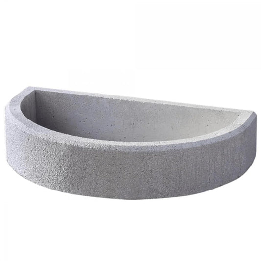 Gray concrete half-round Buschbeck base extension with textured speckled surface and smooth inner curve for masonry BBQs