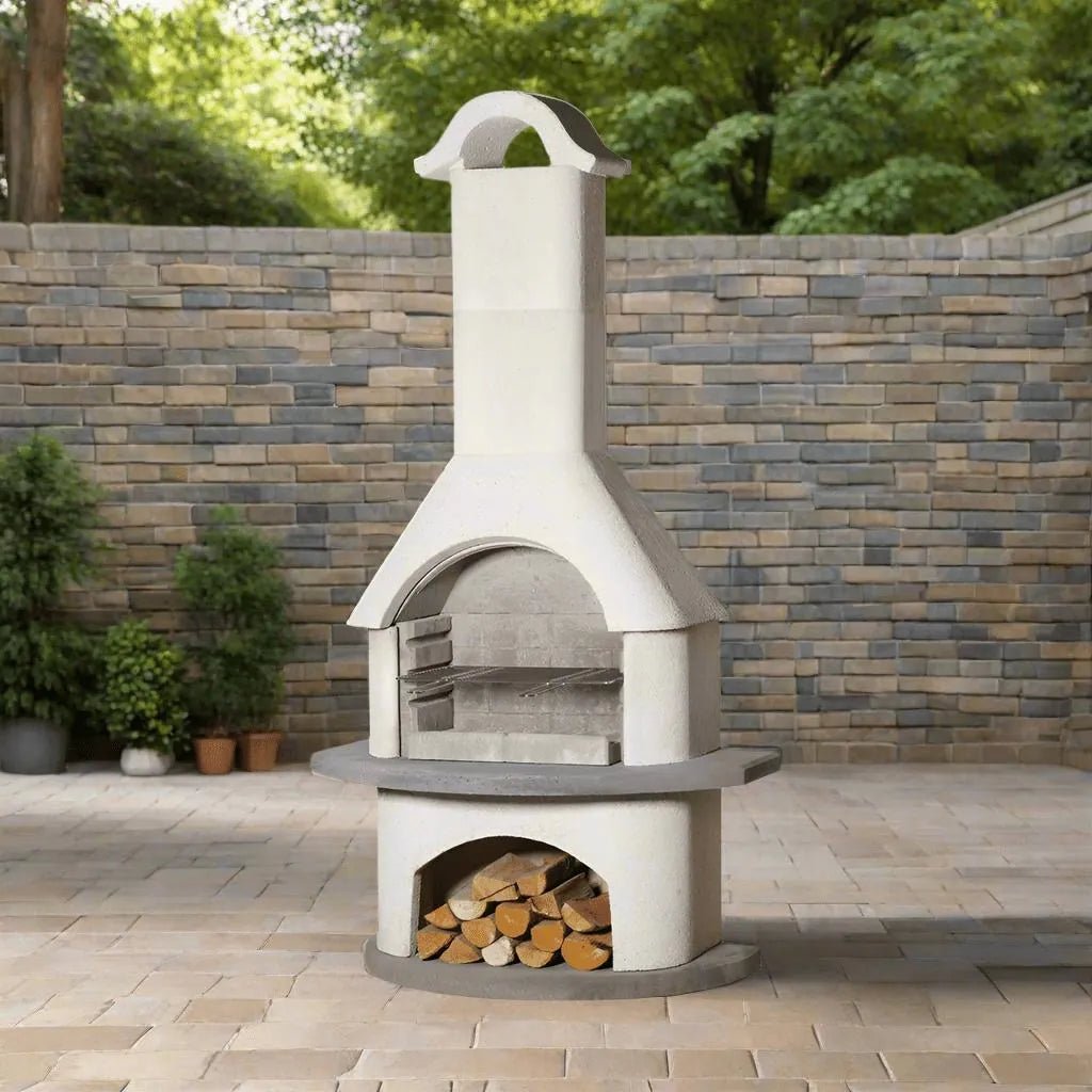 White ceramic outdoor pizza oven with chimney and wood storage compartment by Buschbeck Verona masonry barbecue
