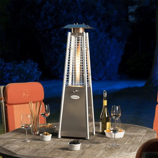 Stainless steel pyramid-shaped chantico tabletop flame patio heater with glowing flame inside mesh cage