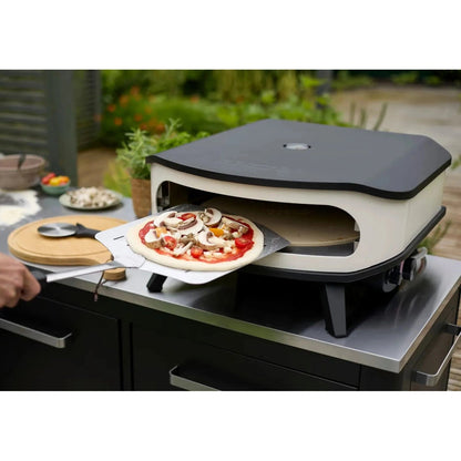Cream-colored and black cozze 17 inch gas pizza oven with rotating stone and sleek modern electric design