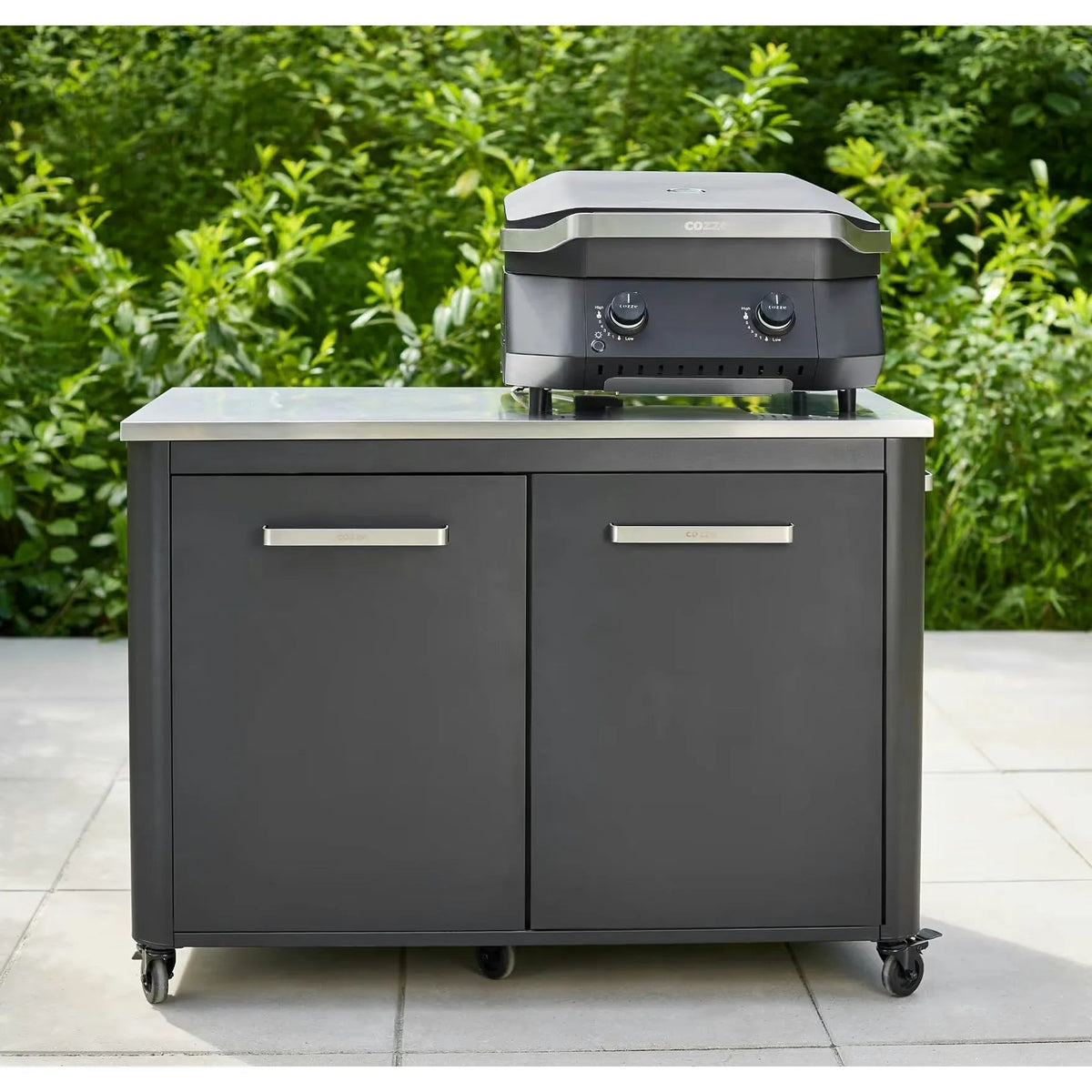 Cozze g-500 gray stainless steel gas grill with 2 control knobs on matching storage cart with caster wheels