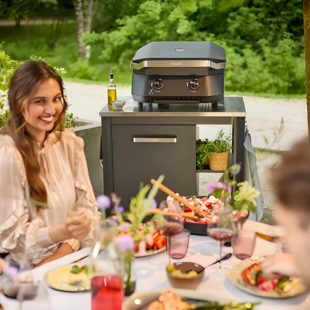 Black and silver Cuisinart outdoor grill with two control knobs in Cozze Outdoor Kitchen 90 1 Door 90527 product line