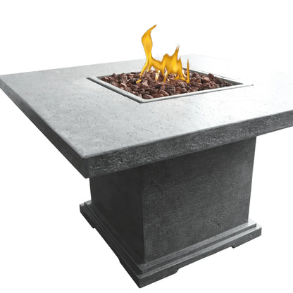 Gray concrete elementi birmingham dining fire table with square burner inset glowing orange flames and dark red lava rocks