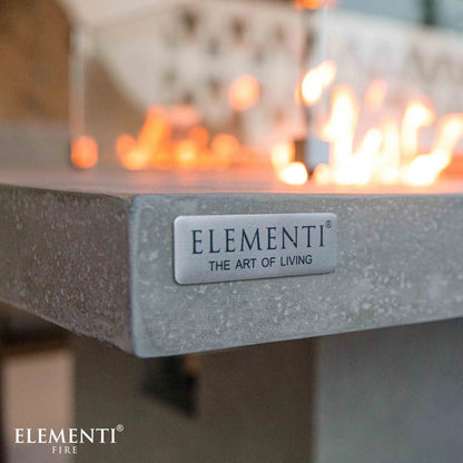 Silver metallic plaque with elementi and the art of living engraved on the elementi birmingham dining fire table