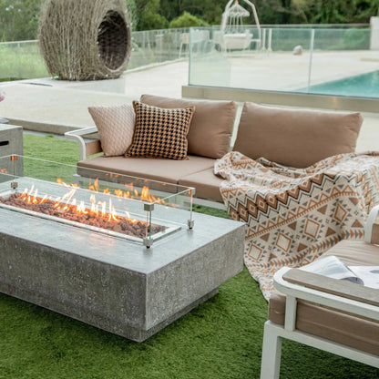 Elementi Hampton fire table concrete fire pit with glass enclosure and glowing flames 13.2 kW OFG139LG