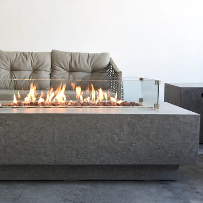 Elementi Kingsale fire table modern concrete fire pit table with glass enclosure and glowing flames 13.2 kW