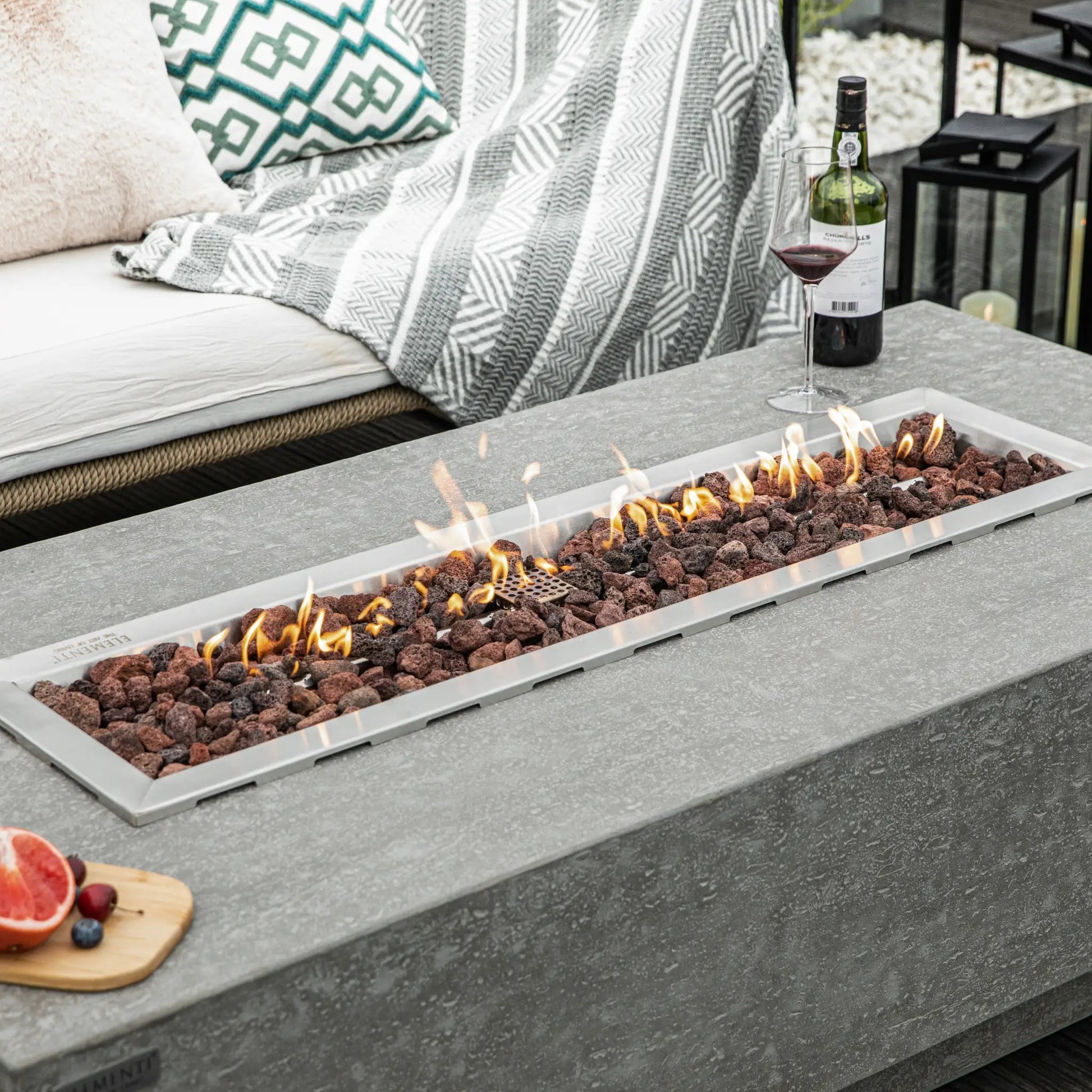 Rectangular stainless steel elementi kingsale fire table insert with glowing orange flames and dark brown lava rocks