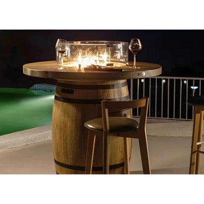 Elementi Lafite wooden barrel bar fire table with glass fire pit and two wine glasses on top in natural wood color