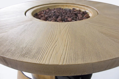 Elementi Lafite Barrel Bar fire table with light-colored wooden frame and circular dark brown gravel fire pit inset