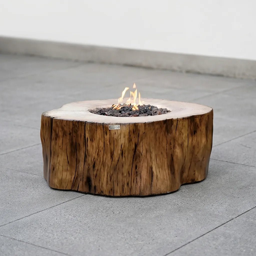 Elementi manchester fire table 13.2 kw rustic natural wood fire pit resembling tree stump with visible grain and bark texture