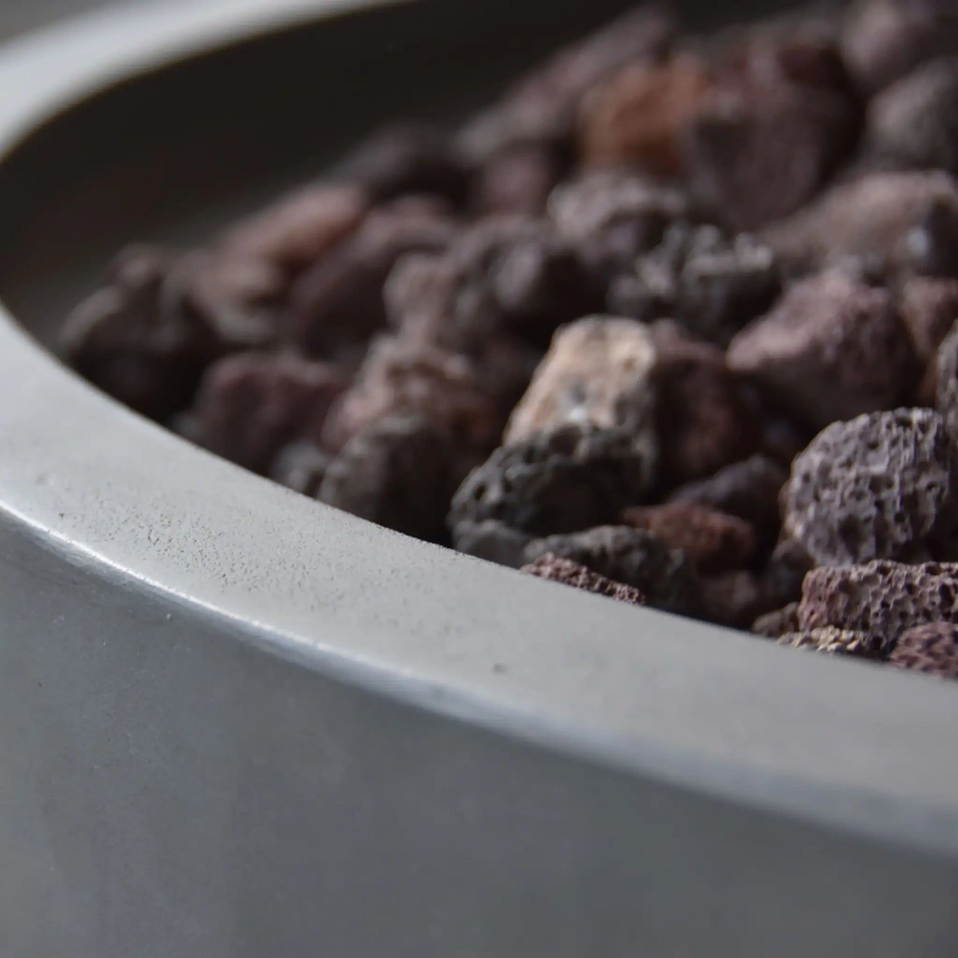 Gray concrete elementi modeno nantucket fire bowl filled with dark porous lava rocks 11.7 kw ofg116