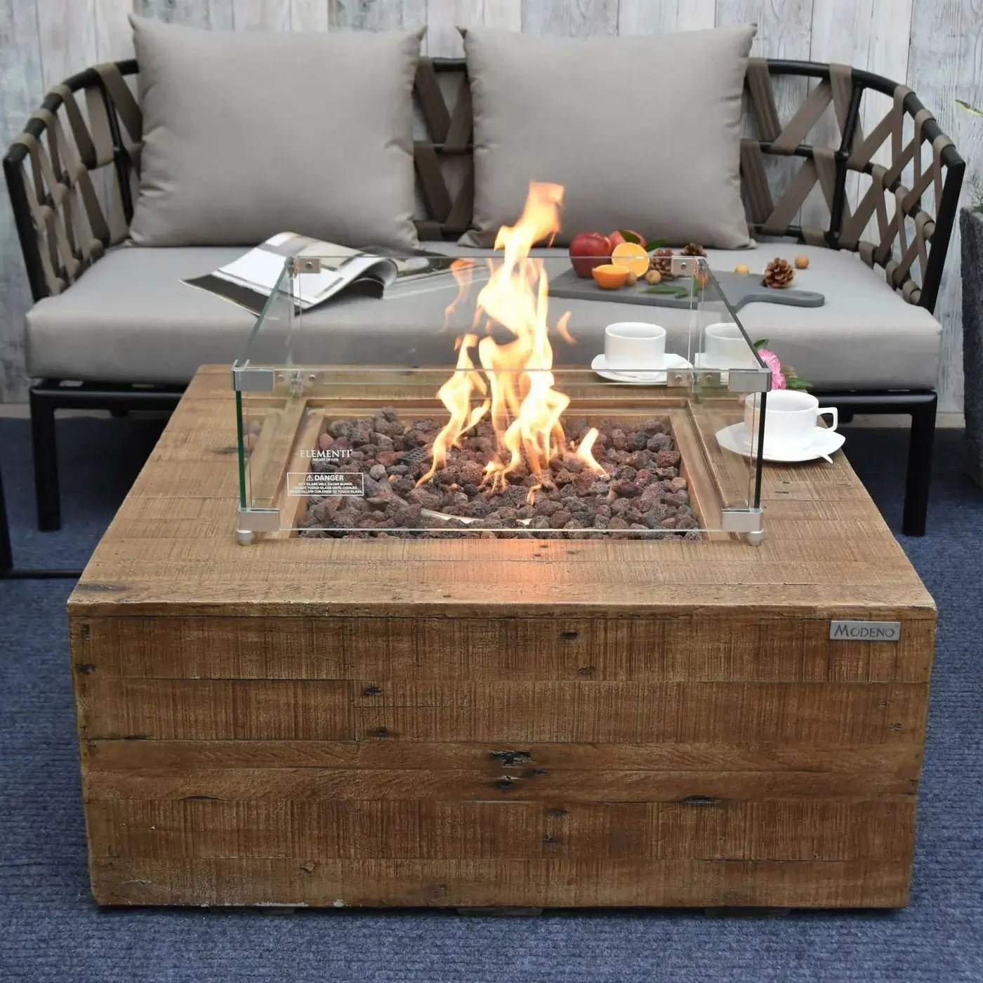 Elementi modeno wilton gas fire pit table with reclaimed wood square design glass enclosure and burning flame