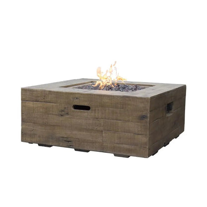 Square outdoor gas fire pit table with weathered wood planks and dark gray glass beads by Elementi Modeno Wilton