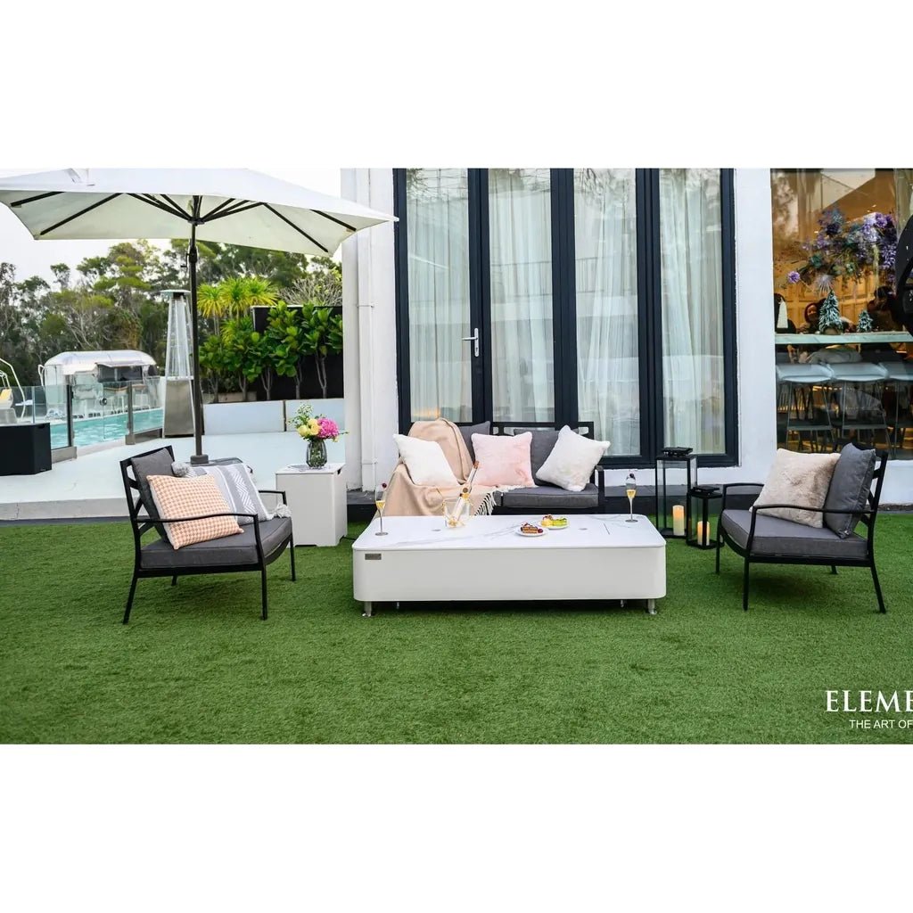 White rectangular outdoor coffee table with sleek modern design and subtle metallic legs elementi plus athens fire table