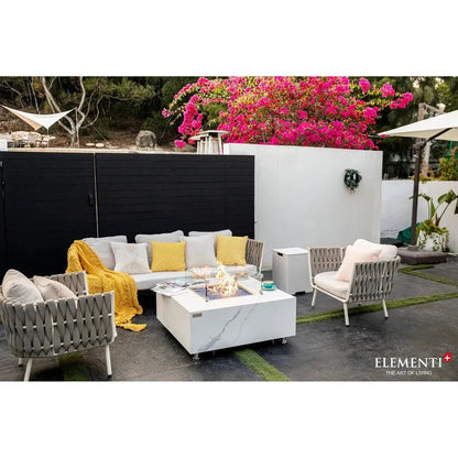 Elementi Plus Bianco fire table with white marble-effect finish glass top and built-in 16 kW flame feature